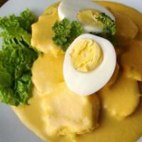 Papa a La Huancaina7.99 · Slowly steamed potatoes topped with a slightly spicy and delicious cheese sauce and a hint o...