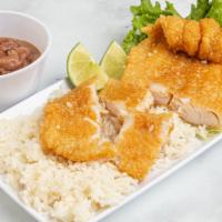 Pescado Frito · Fried fish fillet served with your choice of two sides.
