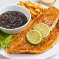 Pescado a La Parilla · Grilled fish fillet served with your choice of two sides.