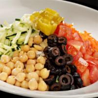 Chopped Italian Salad · Lettuce, tomatoes, carrots, olives, cucumber, chickpeas, pepperoncini, mozzarella and our It...