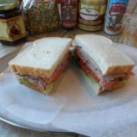 Prime Tri-Tip Sandwich · Tender tri-tip, cheddar cheese, fresh lettuce, sliced tomato, zesty horseradish sauce, thin ...
