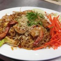 35. Pad Thai Noodle · Stir-fried thin rice noodles with egg, bean sprout, green onion. Topped with ground peanut a...