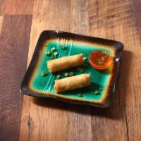 1. Egg Roll · Crispy rolls filled with cabage, carrot, silver noodles with sweet and sours sauce.