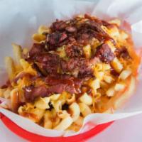 Mac Daddy Fries · A big basket of french fries with mac and cheese, wonder sauce, and pastrami.