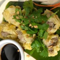 Kanom Jeeb ขนมจีบ · Steamed or fried. Thai meat dumplings stuffed with minced pork, chicken, shrimp, garlic, cil...