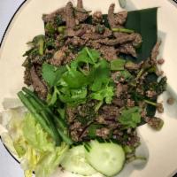 Larb Salad ลาบ · Pork or chicken or beef. Northeastern spicy and sour salad with choice of meat, onion, lime ...