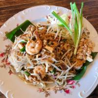 Pad Thai (contains DRIED SHRIMP) ผัดไทย · Rice noodles sauteed with choice of meat, DRIED SHRIMP, PEANUTS, egg, bean curd, bean sprout...