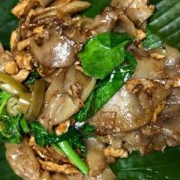 Pad Se Ew ผัดซีอิ๊ว · Flat rice noodles sauteed with your choice of meat, Chinese broccoli, egg and sweet dark soy...