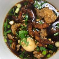 Kuai Chap ก๋วยจั๊บ · Pork broth with rolled up rice noodle sheets, pork intestine, pork liver, boiled egg, scalli...