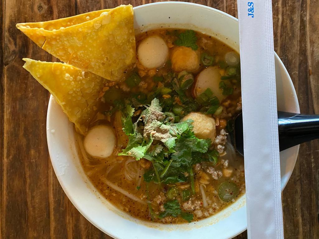 N14. Tom Yum Noodle Soup ก๋วยเตี๋ยวต้มยำ · Rice noodle with spicy and sour soup, minced pork, fish ball, shrimp ball, bean sprouts, peanut, cilantro and fried wonton sheets. Spicy.