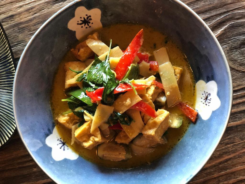 C1. Green Curry แกงเขียวหวาน · Green curry paste, Thai eggplant, bamboo shoot, fresh basil, bell pepper and coconut milk. Spicy.