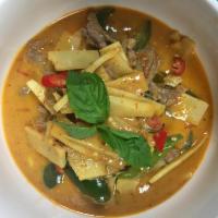 C2. Red Curry แกงเผ็ด · Red curry paste, Thai eggplant, bamboo shoot, fresh basil, bell pepper and and coconut milk....