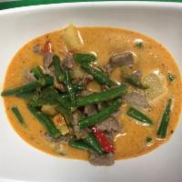 C3. Panang Curry พะแนง · Panang curry paste, bell pepper and coconut milk. Spicy.