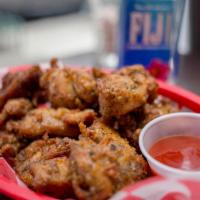 R.O.C. Popcorn Chicken · Delectable bite-sized pieces of fried chicken, coated in a house blend of seasoning.