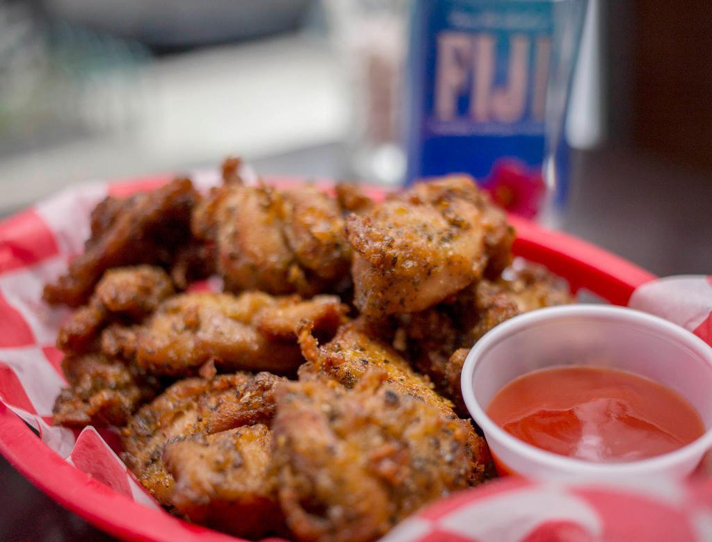 R.O.C. Popcorn Chicken · Delectable bite-sized pieces of fried chicken, coated in a house blend of seasoning.