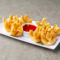 4. Krab Rangoon · 8 piece. Mariposas fritas con queso creama.