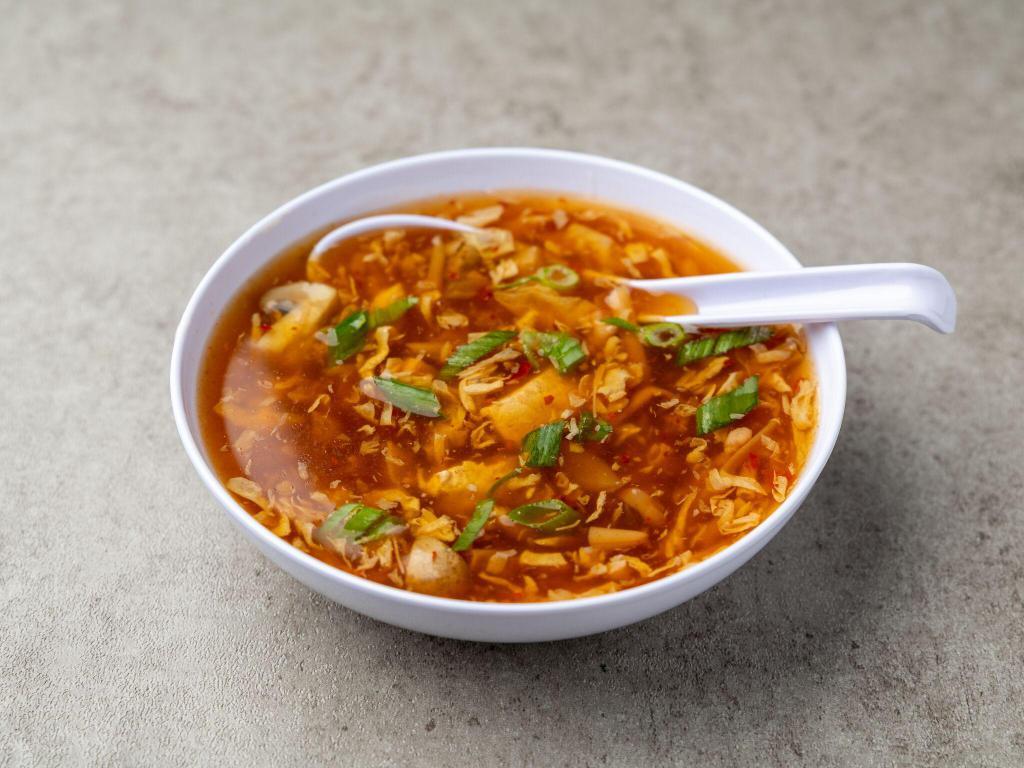 Hot and Sour Soup · A traditional Chinese soup with broth, eggs, tofu and vegetables.