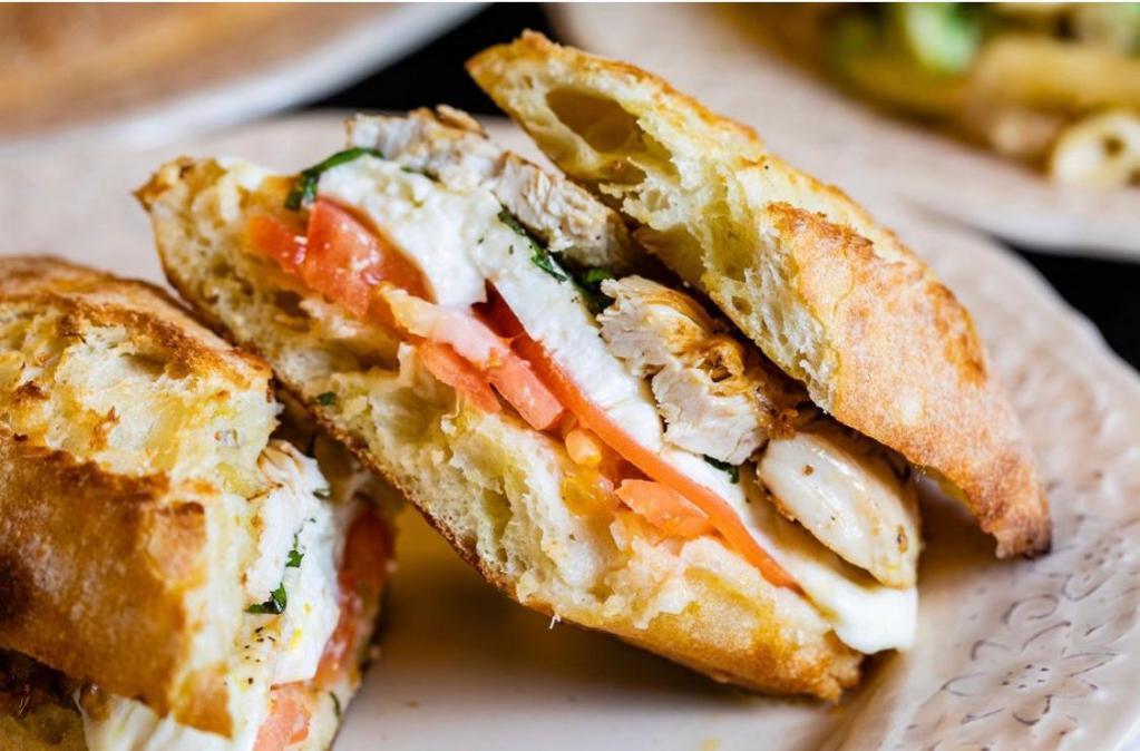 Grilled Chicken Panini · Fresh mozzarella, tomatoes, fresh basil, imported extra virgin olive oil, herbs, salt and pepper.