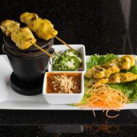 5. 5 Pieces Satay Chicken · Skewers of grilled, marinated chicken served with peanut sauce and  cucumber salad.