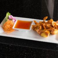10. 4 Pieces Crab Rangoon · Imitation crab meat with cream cheese, wrapped with wonton skin and served with sweet and so...