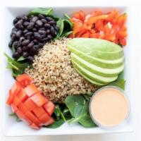 The Southwest Salad (V) · Vegan and gluten-free. Spinach layered with quinoa, black beans, avocado, bell pepper, tomat...
