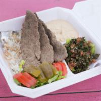 Kafta Kebab Plate with Tabouli and Hummus · Beef kafta, hummus, tabouli, tomatoes, lettuce, pickles and pita bread.