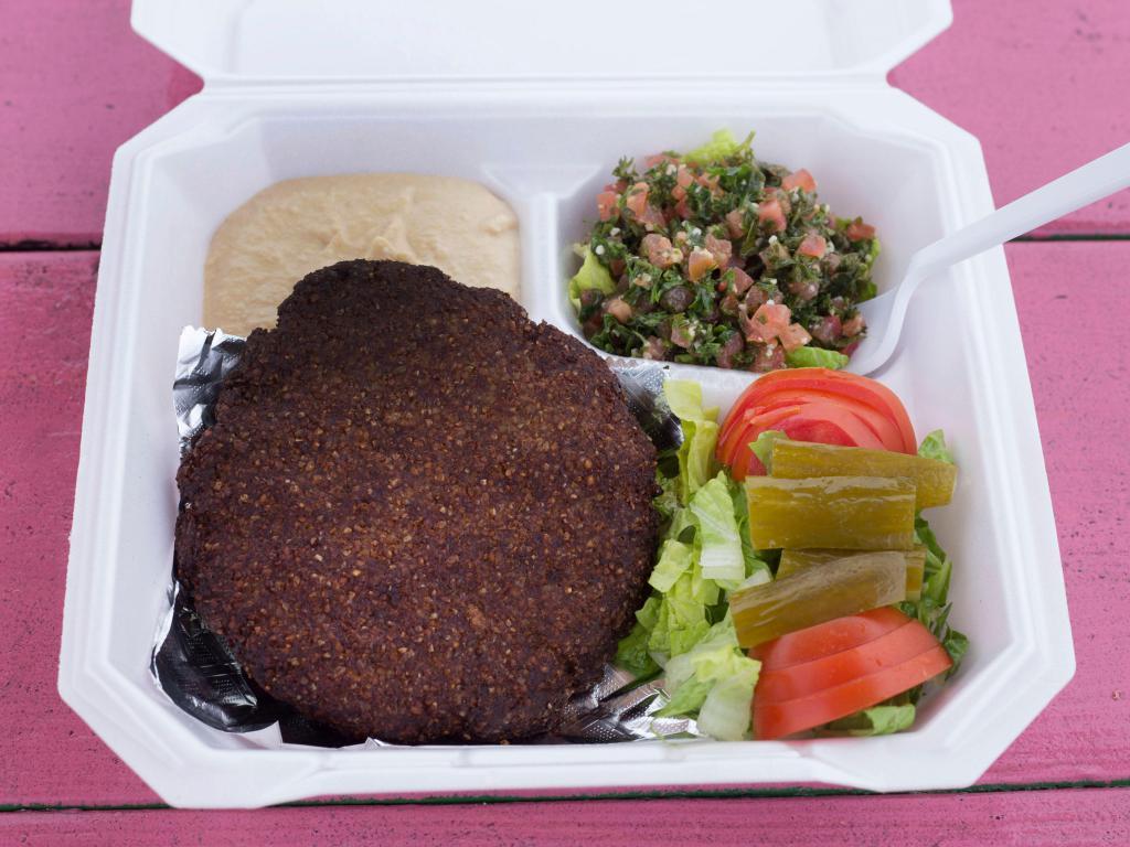 Kibbeh Plate with Tabouli and Hummus · Kibbeh meat, hummus, tabouli, tomatoes, lettuce, pickle and pita bread.