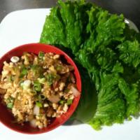 Chicken Wrap · Stir fried chicken, chopped ginger, onions and red bell pepper served with lettuce wrap.