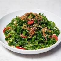 Kale and Quinoa · Organic quinoa, kale, heirloom tomatoes, golden raisins, toasted almonds, fried shallots, pa...