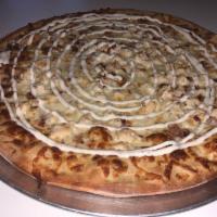 Chicken Ranch Bacon Pizza · Marinated grilled chicken with bacon and ranch dressing and a blend of cheeses.