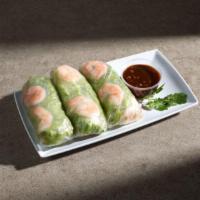 A4. Goi Cuon Tom Thit · Spring rolls. Poached shrimp, pork, lettuce, vermicelli noodles and bean sprouts, wrapped in...
