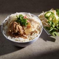 P1. Pho Dac Biet · House special combo pho . combination of rare beef slice, well done brisket, flank, tendon a...
