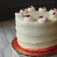 Red Velvet Cake · # layers of Red Velvet cake and 2 layers of Cream cheese frosting with Red Velvet crumbs