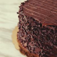 Triple Chocolate Fudge · Chocolate Cake, Chocolate Mousse Filling, & Fudge Frosting
