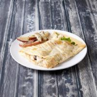 Caesar Crepe · Diced chicken breast, sliced tomatoes, mushrooms and mozzarrella cheese with a Caesar drizzle.