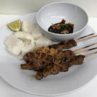 5 Pieces Sate Kambing / Young Goat Satay · Skewer grilled young goat with rice cake and sweet soy sauce.