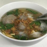 Bakso Tennis / Tennis Meat Ball · Meatball soup served with egg noodle, vermicelli, fried tofu and yu choy.