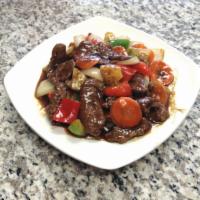 Hawaiian Beef · Stir-fried beef with peppers, onion, celery, carrots and pineapple. Served with steamed rice. 