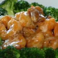Walnut Shrimp · Lightly breaded shrimp in honey walnut sauce, served with steamed broccoli and topped with w...