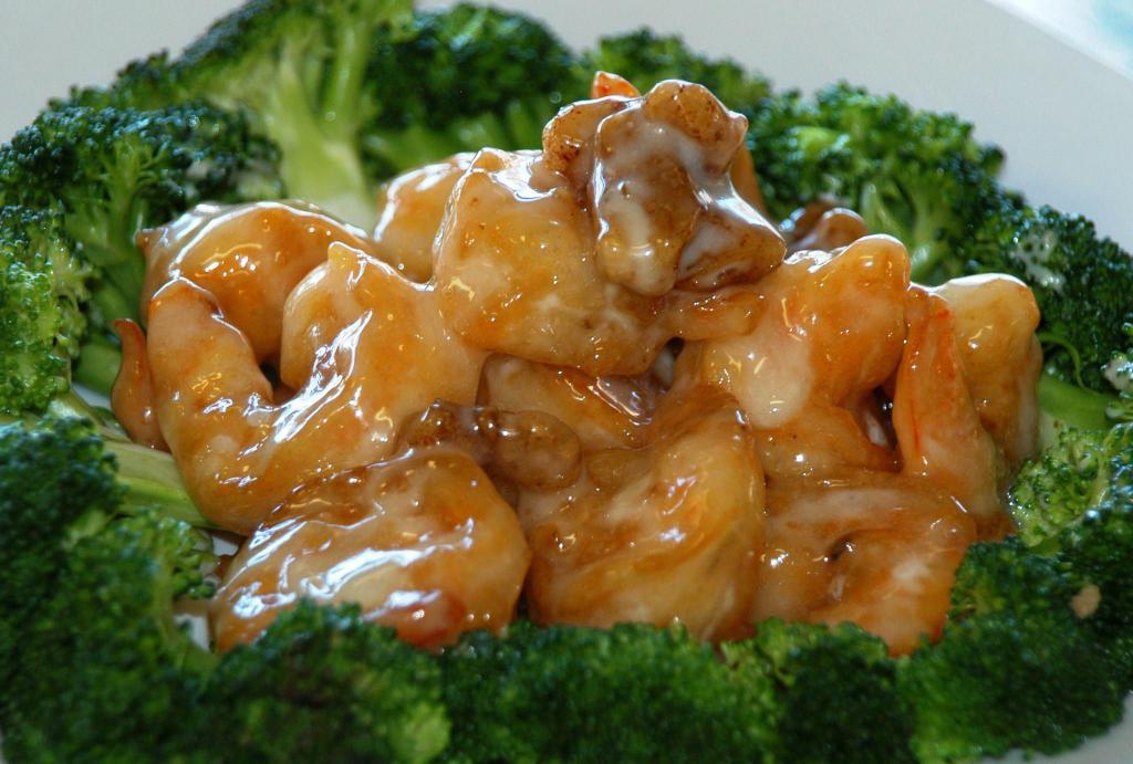 Walnut Shrimp · Lightly breaded shrimp in honey walnut sauce, served with steamed broccoli and topped with walnuts. Served with steamed rice. 