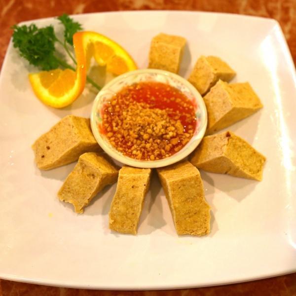 7. Golden Tofu · Deep-fried until golden brown tofu, then served with sweet chili sauce topped with ground peanuts.