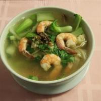 Wonton Soup · Wonton stuffed with ground chicken, served with bok choy, cilantro, roasted garlic and scall...