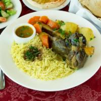 1. Moroccan Lamb Shank · One tender lamb shank marinated with special sauce and baked with mixed vegetables. Served w...