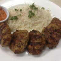 11. Chicken Kofta · Two skewers of ground chicken seasoned with special spices then char broiled. Served with hu...