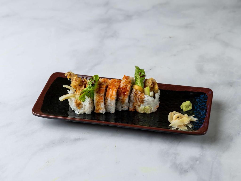 Spider Roll · Soft shell crab, cucumber, avocado, lettuce, tobiko and eel sauce.