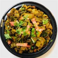 V11. Bhindi Masala · Okra with onions, tomatoes and mango powder. Served with rice. Gluten-free.