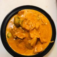 C2. Tikka Masala Curry · Cooked with cashews, onions and green pepper creamy sauce. Served with basmati rice. Gluten-...