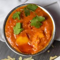 C8. Vindaloo Curry · A fiery affair and potatoes. Served with basmati rice. Gluten-free. Spicy.