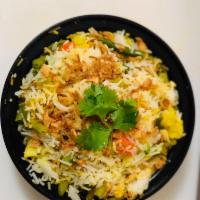 R1. Vegetable Biryani · Cooked aromatic basmati rice, richly flavored saffron, herbs and spices. Served with raita. ...