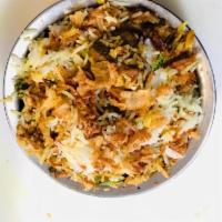 R3. Lamb Biryani · Cooked aromatic basmati rice, richly flavored saffron, herbs and spices. Served with raita. ...
